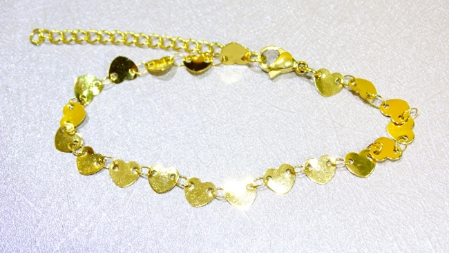 PULSERA ACERO DORADO CORAZONES*