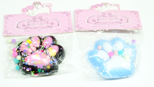 SQUISHY GARRA PATITA GATO MULTICOLOR POMPOM 12 CM