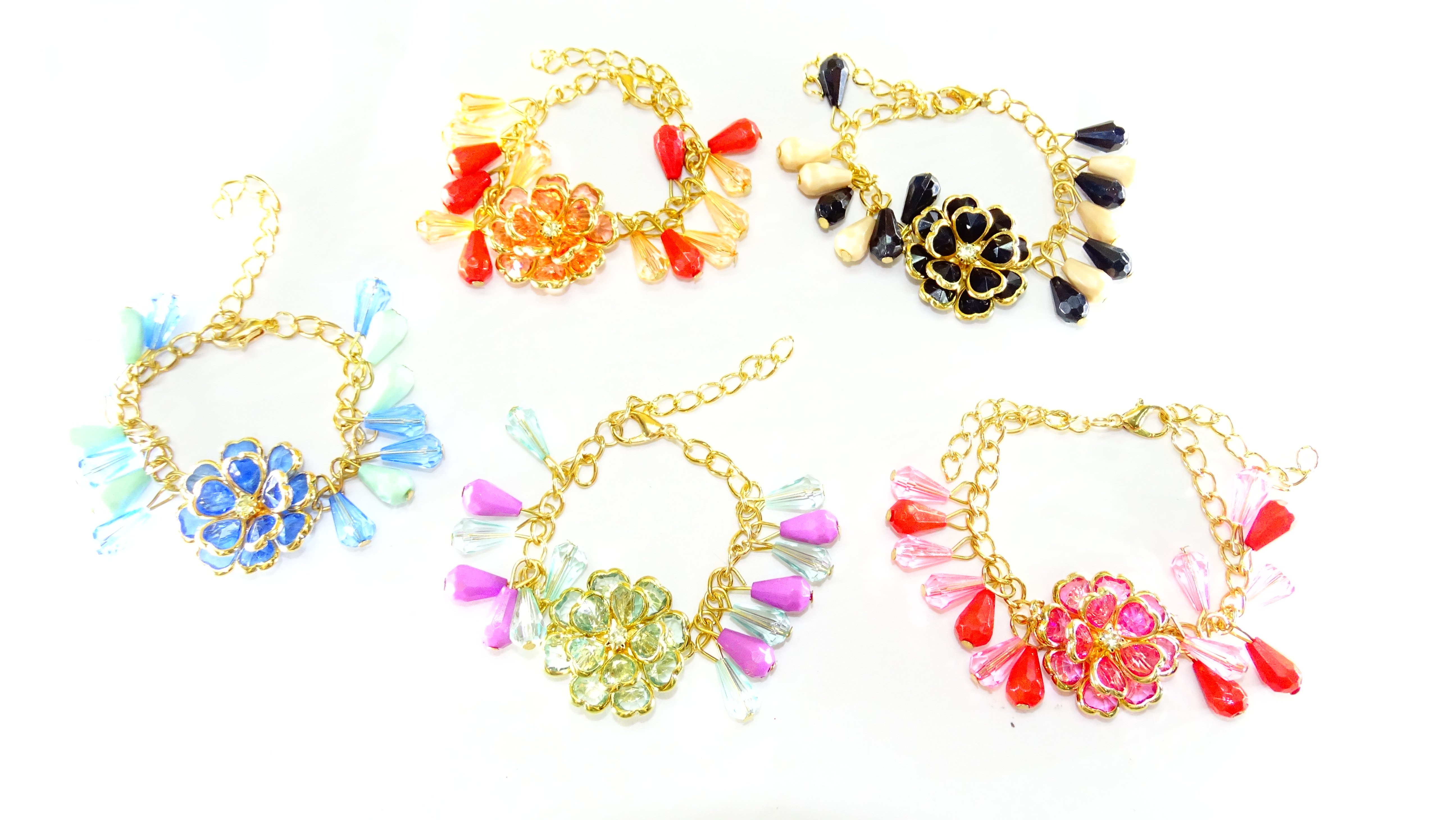 PULSERA FLOR CON DORADO VARIOS COLORES+++