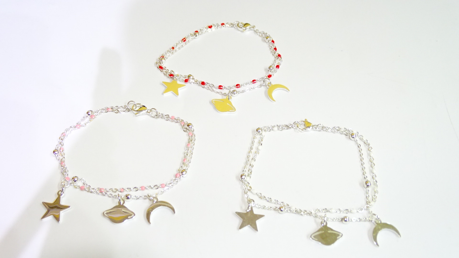 PULSERA ACERO BLANCO ESTRELLA LUNA Y PLANETA+++