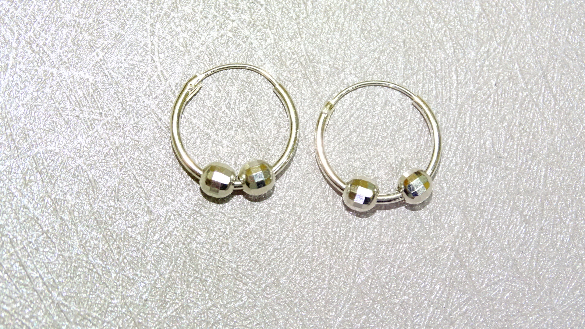 AROS PLATA 2 BOLITAS FACETADAS 1,2CM 